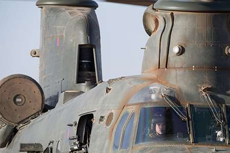 Sqn Ldr Matthew Wight-Boycott at the controls of a RAF CH 47 Chinook