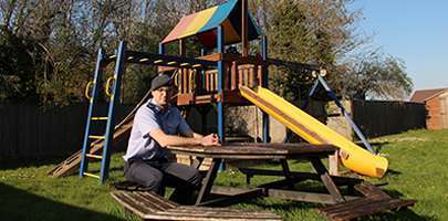 Image Corporal Neil Livesey in garden of contact house