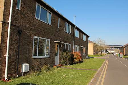 Image shows exterior of Contact houses