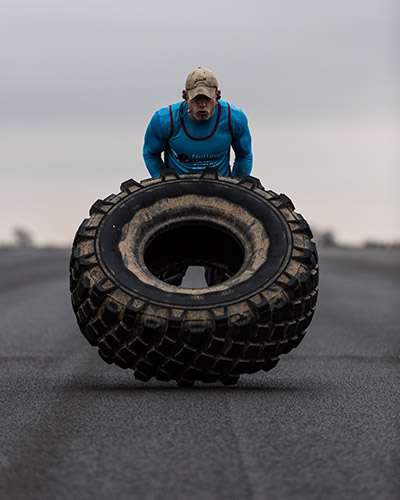 Flt Lt Dan Garner tyre flipping